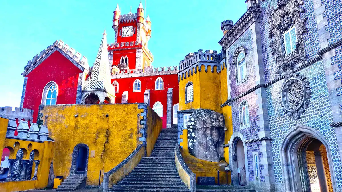 Colourful terraces of Pena Palace on a half-day Sintra tour from Lisbon with Quinta da Regaleira